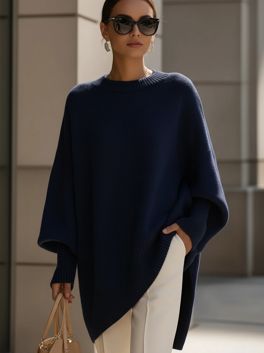 Jersey poncho de punto con mangas anchas