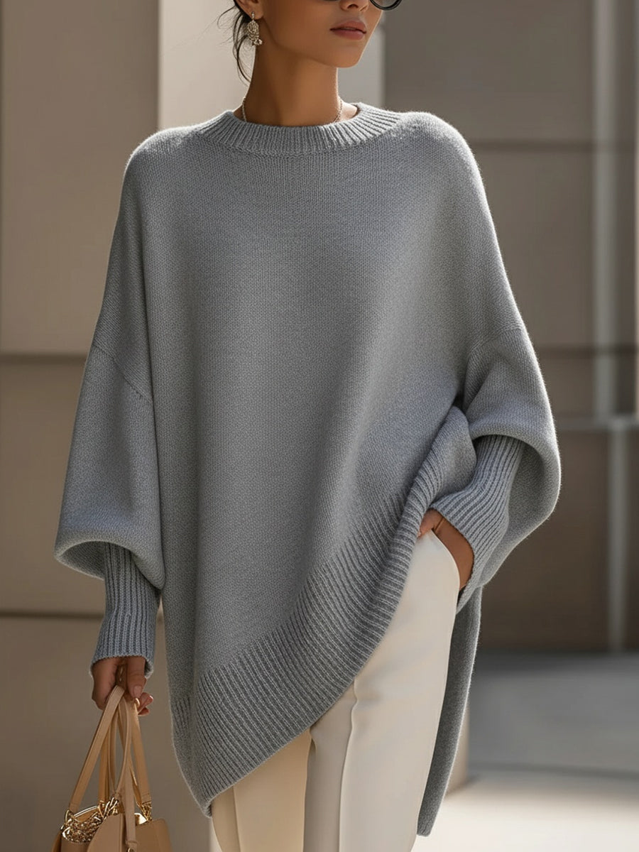 Jersey poncho de punto con mangas anchas