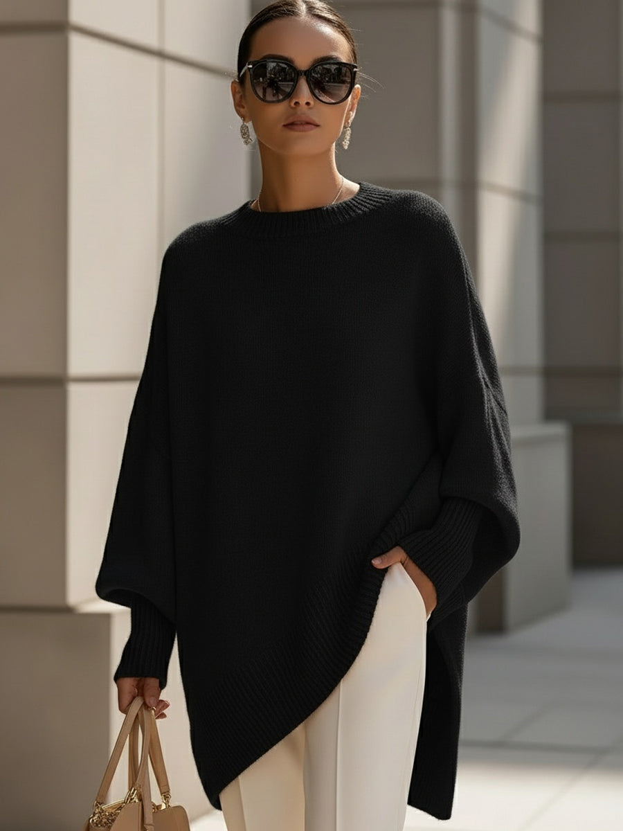 Jersey poncho de punto con mangas anchas