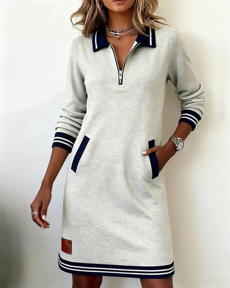 Vestido sudadera corto informal con ribetes en contraste y cuello con cremallera
