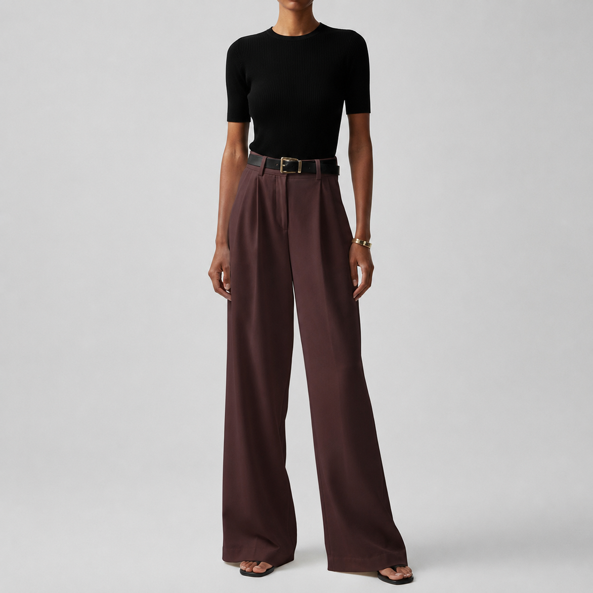 Pantalones elegantes de talle alto con pierna ancha y pinzas delanteras