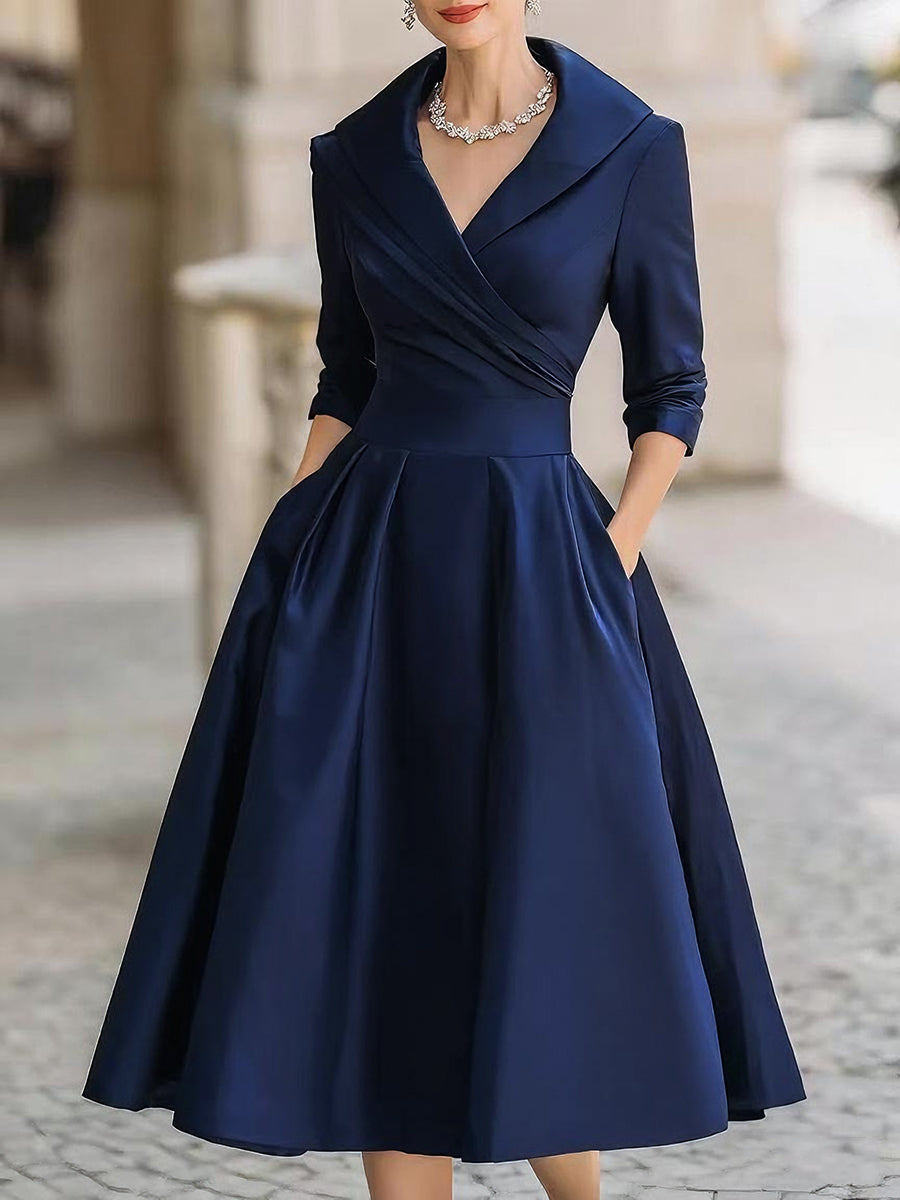 Vestido midi elegante en A con cuerpo cruzado y falda con vuelo