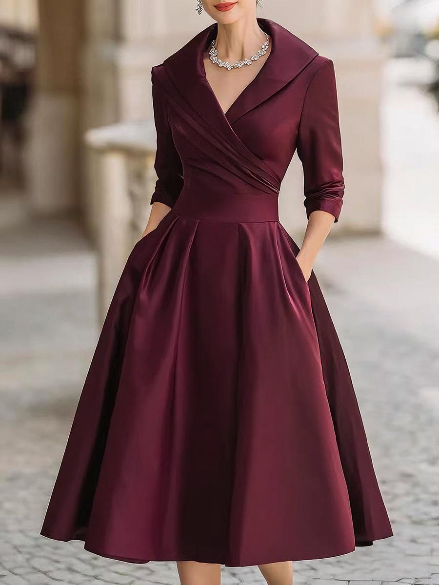 Vestido midi elegante en A con cuerpo cruzado y falda con vuelo