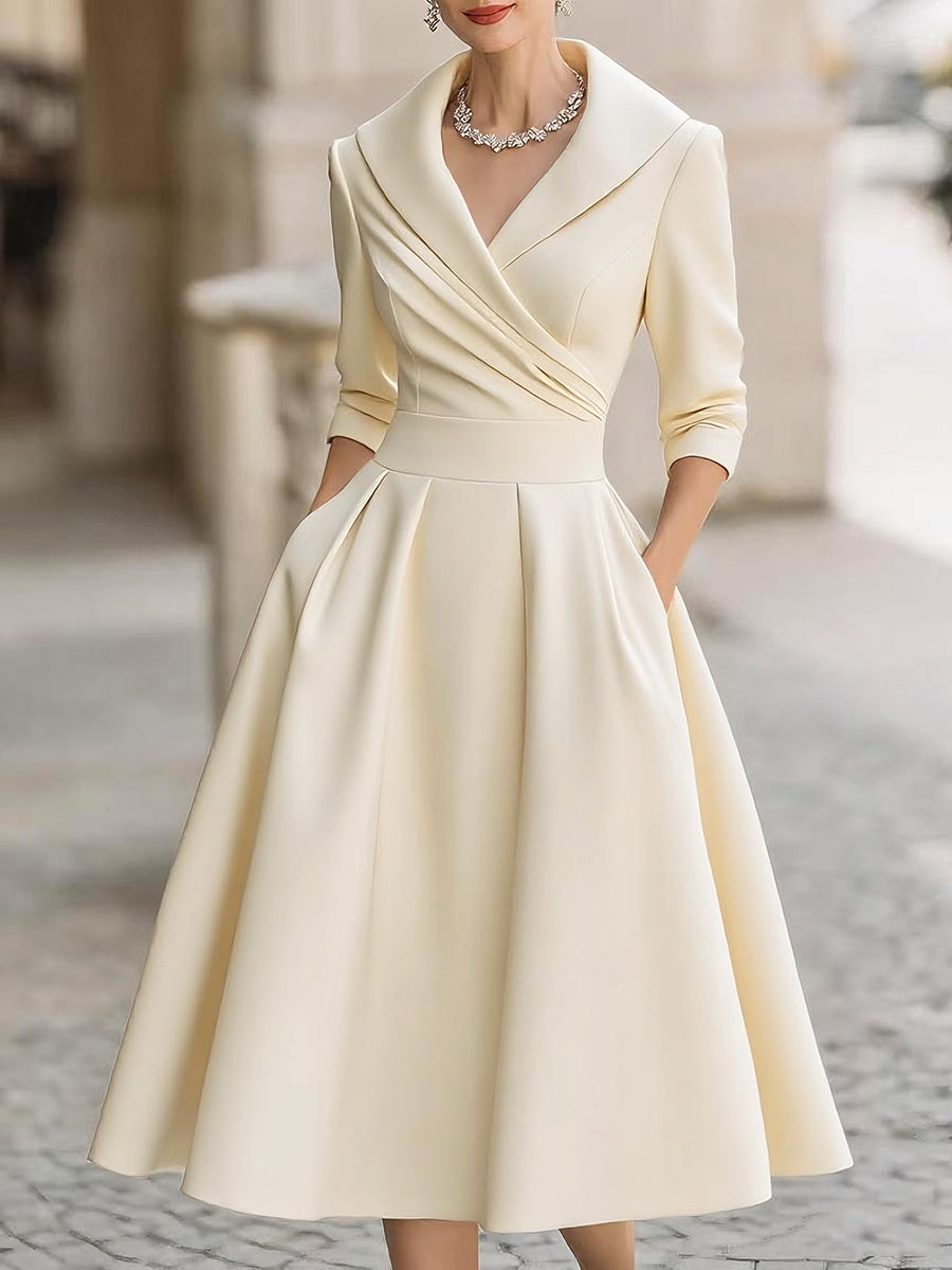 Vestido midi elegante en A con cuerpo cruzado y falda con vuelo