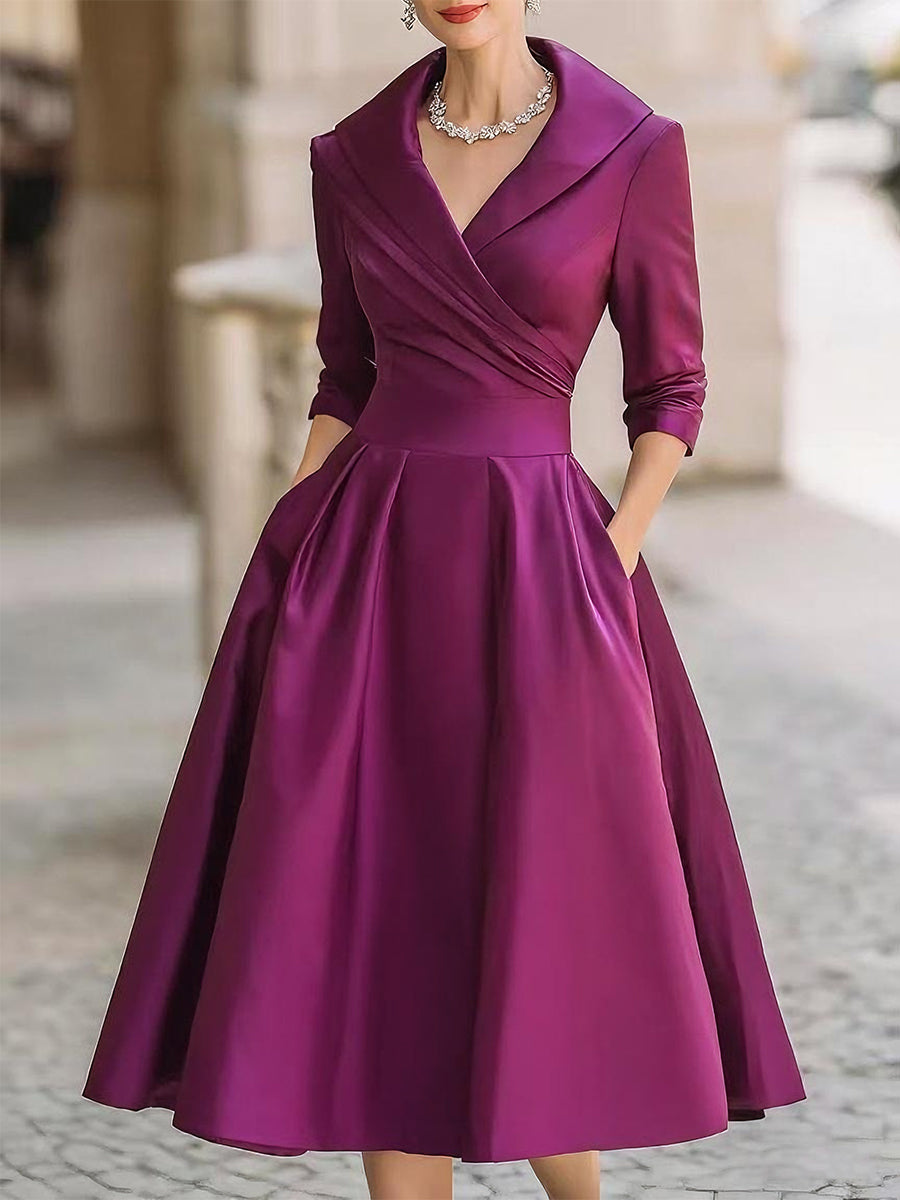 Vestido midi elegante en A con cuerpo cruzado y falda con vuelo
