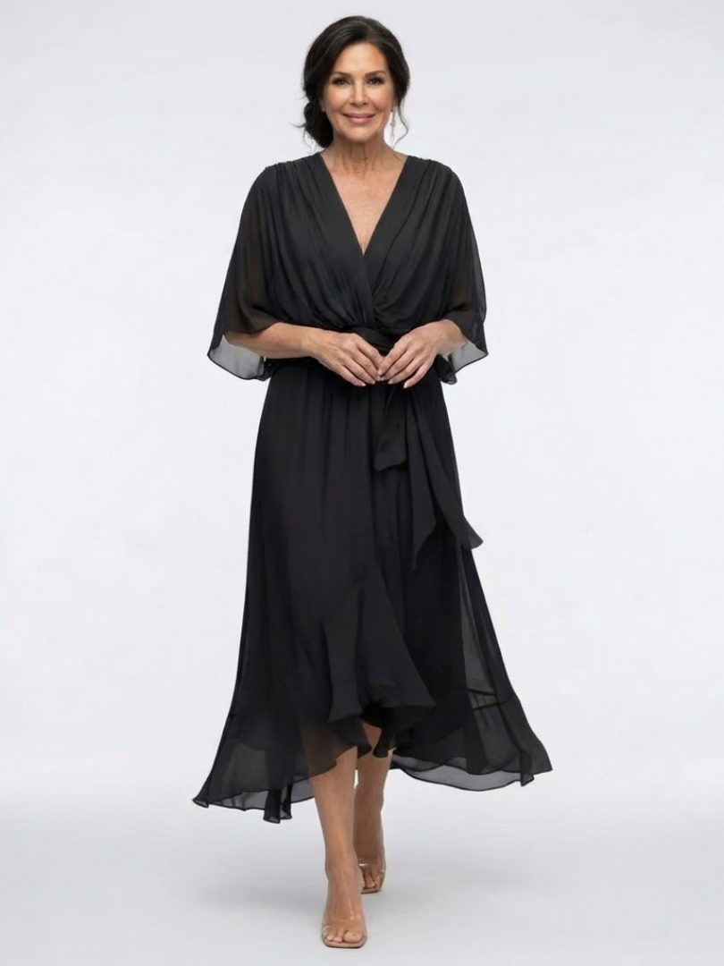 Vestido midi cruzado elegante con mangas kimono y lazada en la cintura
