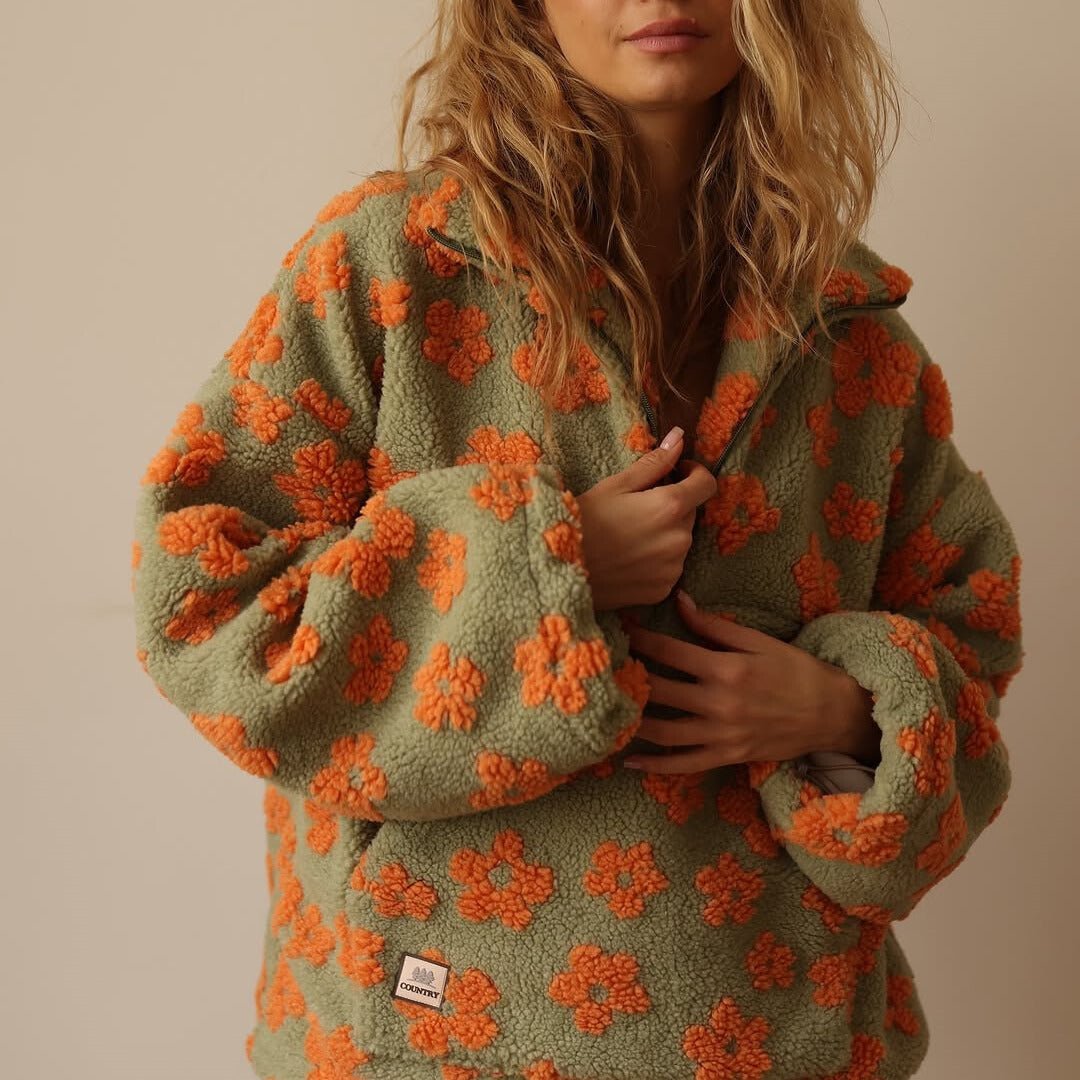 Chaqueta oversize de borreguillo floral con media cremallera