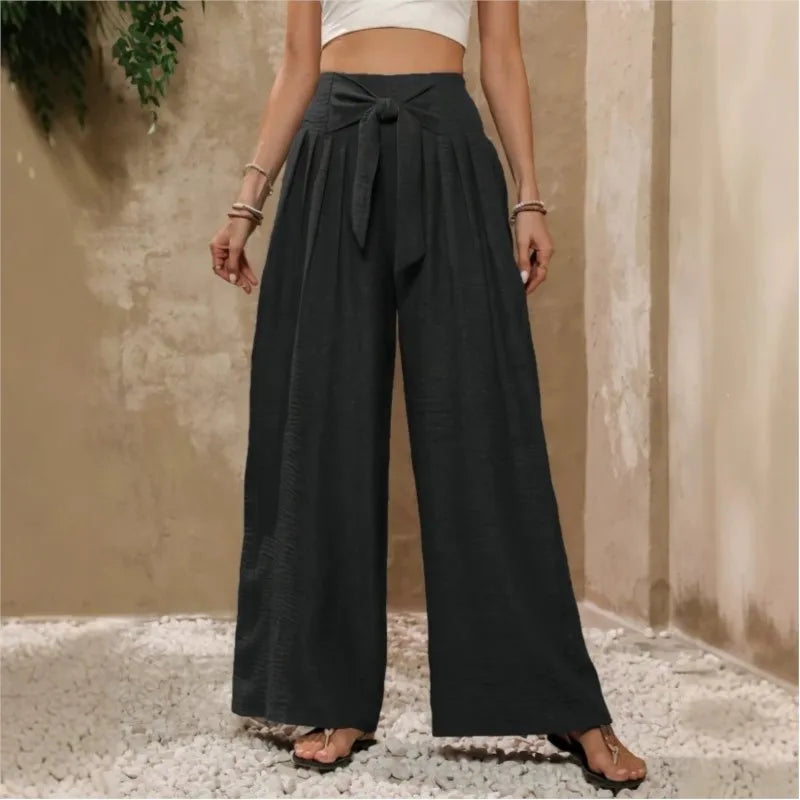 Pantalones anchos de talle alto con lazada en la cintura