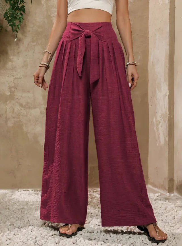 Pantalones anchos de talle alto con lazada en la cintura