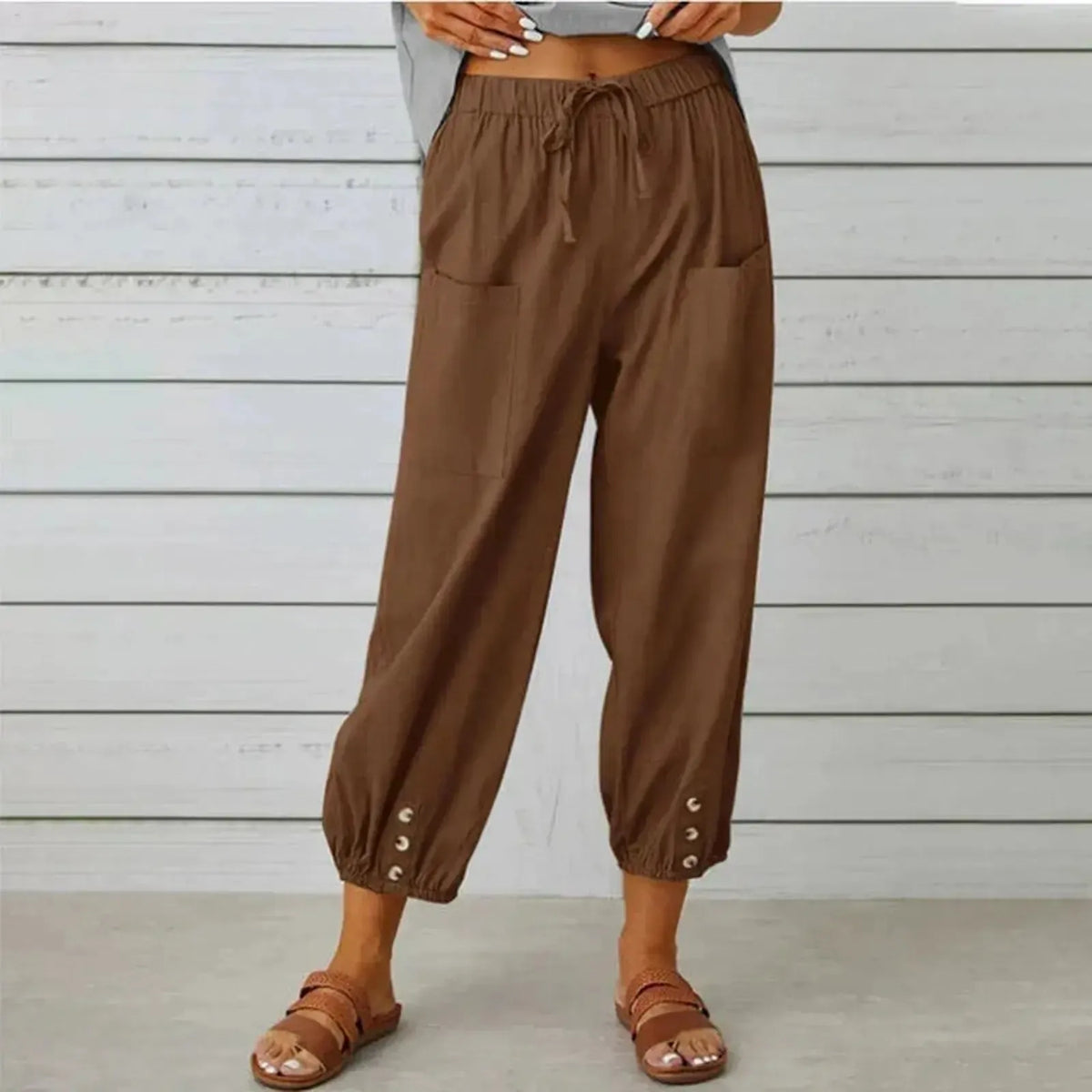 Pantalones harem holgados con cordón, puños elásticos y bolsillos de parche