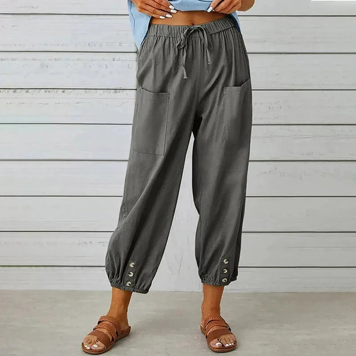 Pantalones harem holgados con cordón, puños elásticos y bolsillos de parche