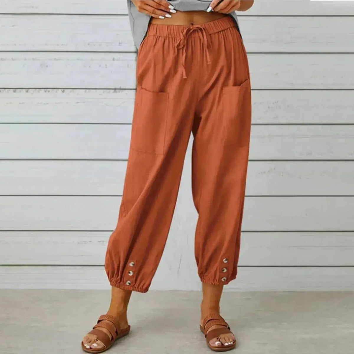Pantalones harem holgados con cordón, puños elásticos y bolsillos de parche