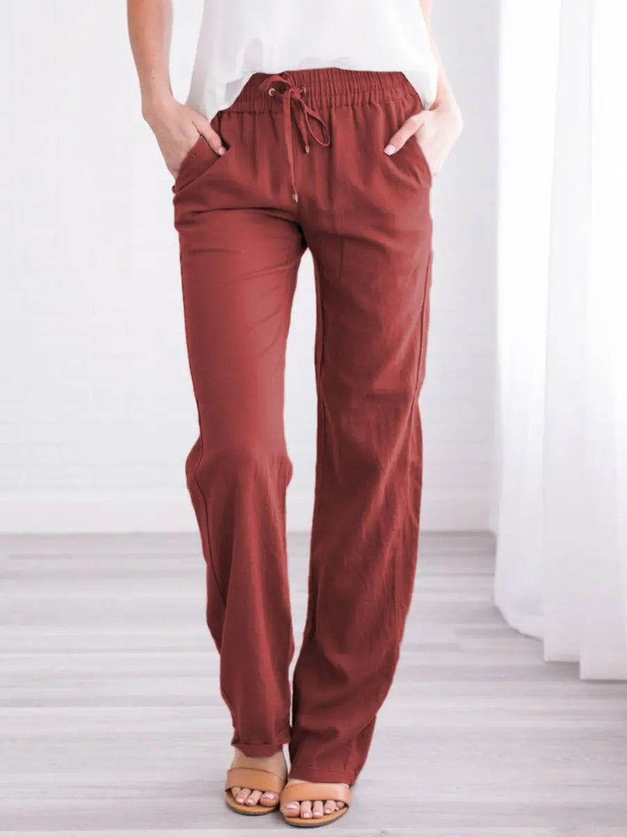 Pantalones holgados con cintura elástica, cordón y bolsillos laterales