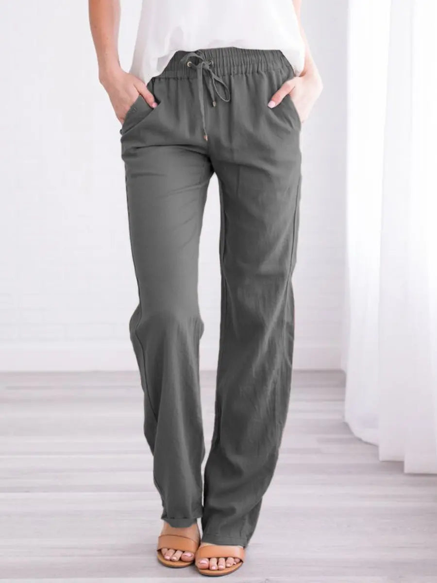 Pantalones holgados con cintura elástica, cordón y bolsillos laterales