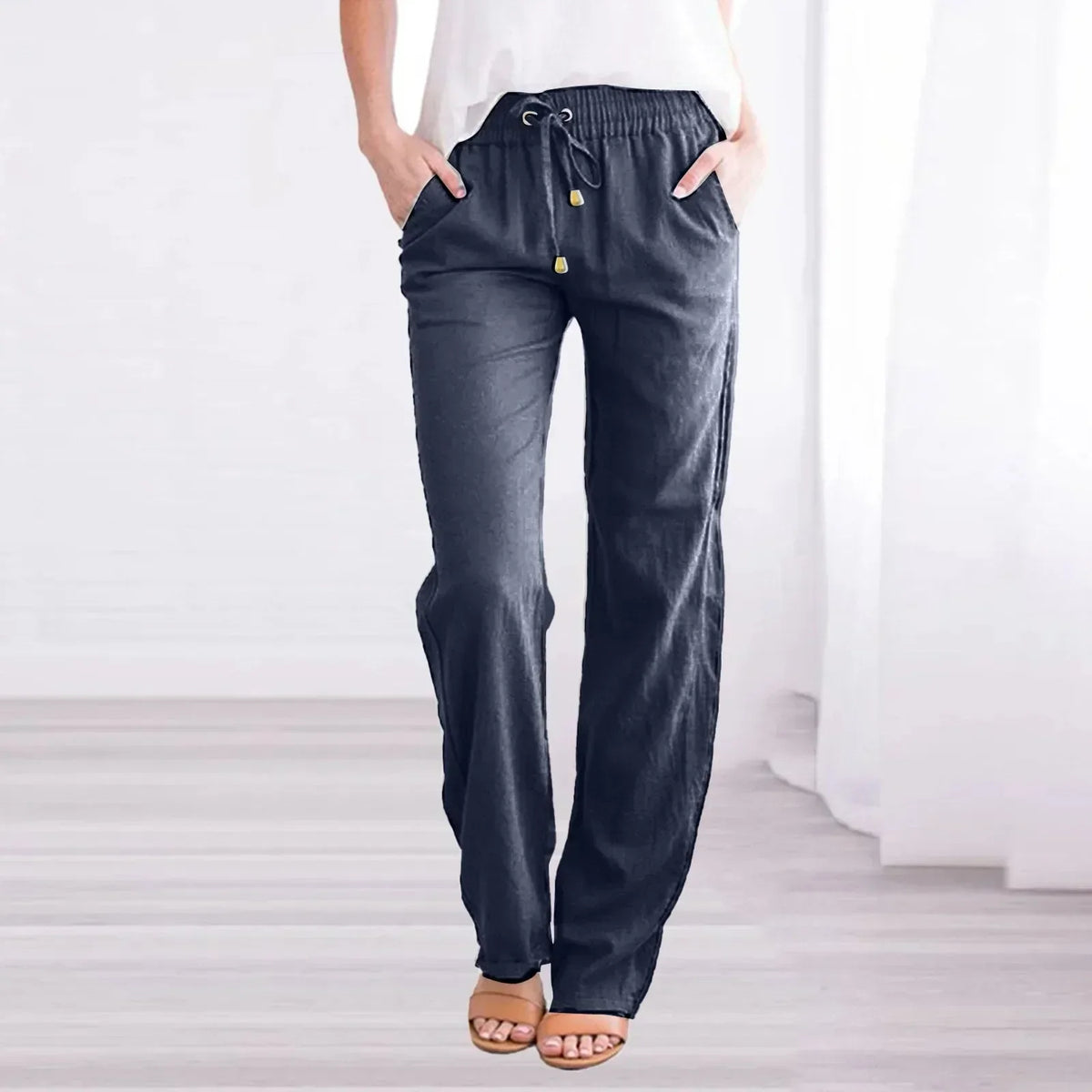 Pantalones holgados con cintura elástica, cordón y bolsillos laterales