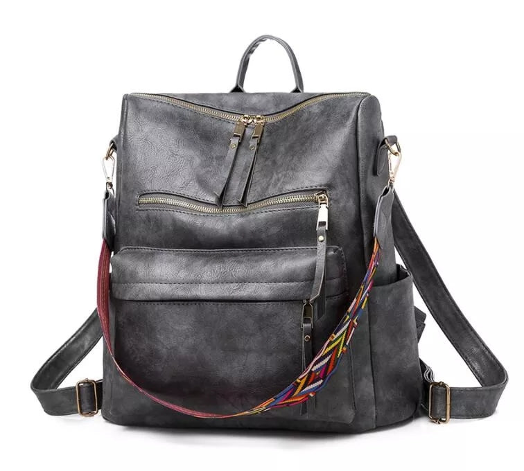 Mochila convertible espaciosa con asa superior